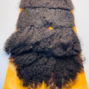 Bundle of dark, tight curly hair extensions displayed on an orange backing with a red label reading '220g 7PCS' at the top (hair product packaging).
