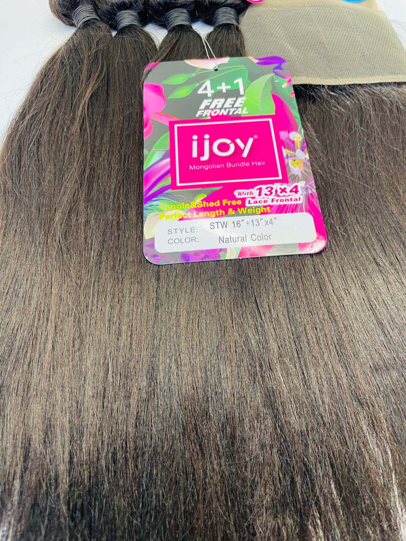 Bundle of dark brown hair extensions with a colorful tag reading 'ijoy Mongolian Bundle Hair' and '4+1 Free Frontal' (hair product label)
