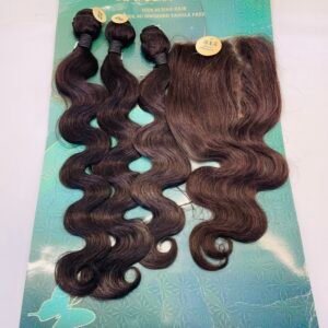 Bundle of dark brown, wavy hair extensions laid on a teal packaging card with a butterfly design
