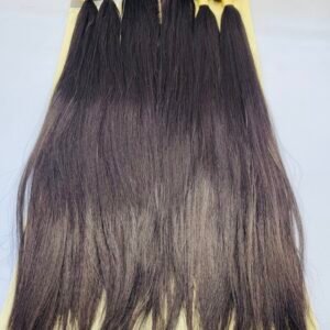 Product image of five long straight dark brown hair extension bundles attached to a yellow display card for sale, arranged side by side on a pale surface.