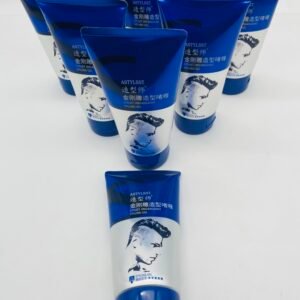 Blue styling gel tubes arranged upright with a white label showing a black portrait and the words Styling Gel on blue packaging, multiple tubes visible