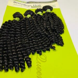 Close-up of curly black hair bundles laid on a neon yellow card labeled 'Brazilian Hair Quality'—hair extensions product.