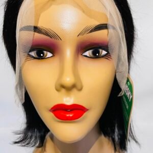 Mannequin head wearing a beige net wig cap with bold purple eye makeup and bright red lips.