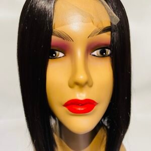 Mannequin head wearing a long straight black wig with a beige hair net at the hairline and bright red lips; torso visible below the chin.